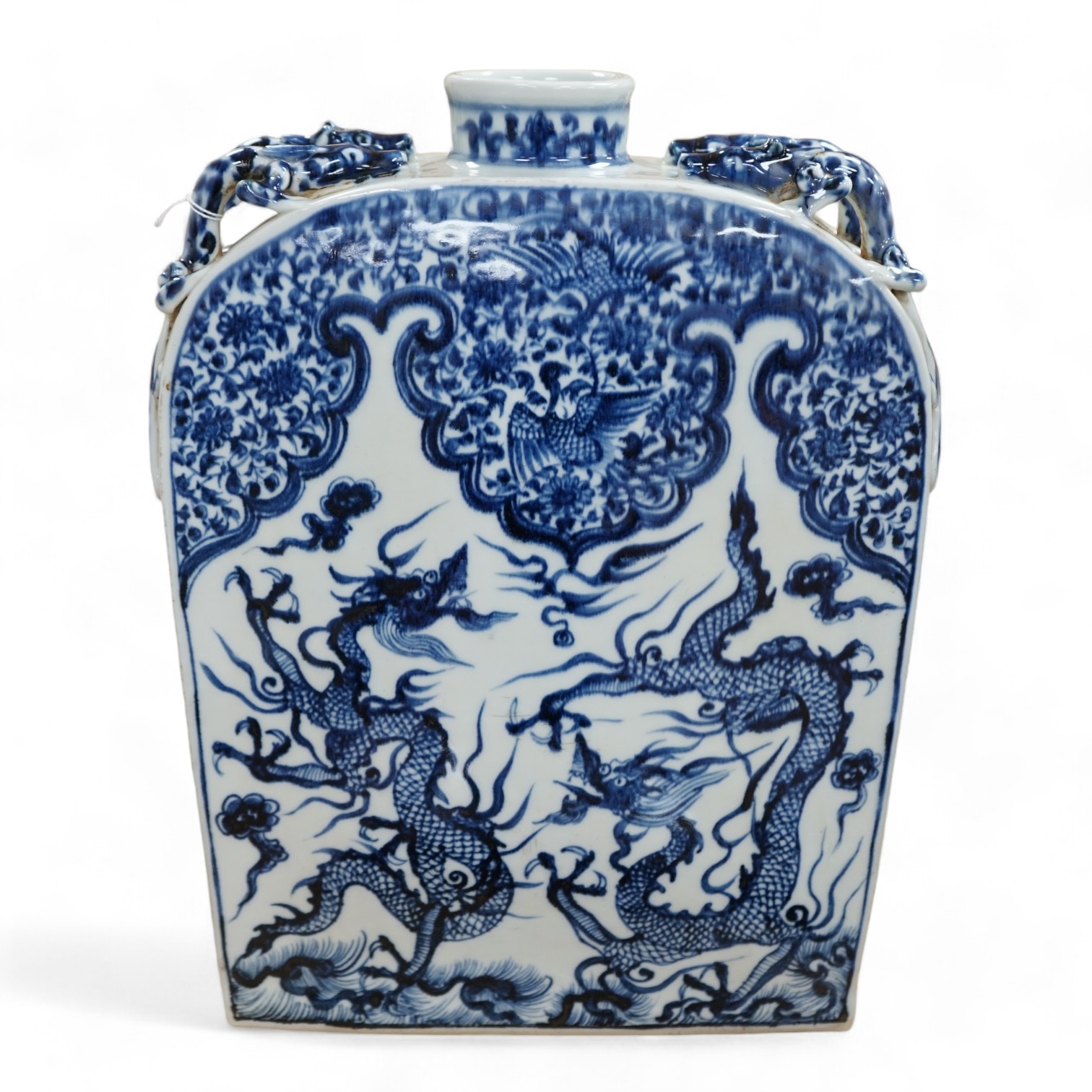 A large Chinese blue and white dragon flask, 39cm high. Condition - good